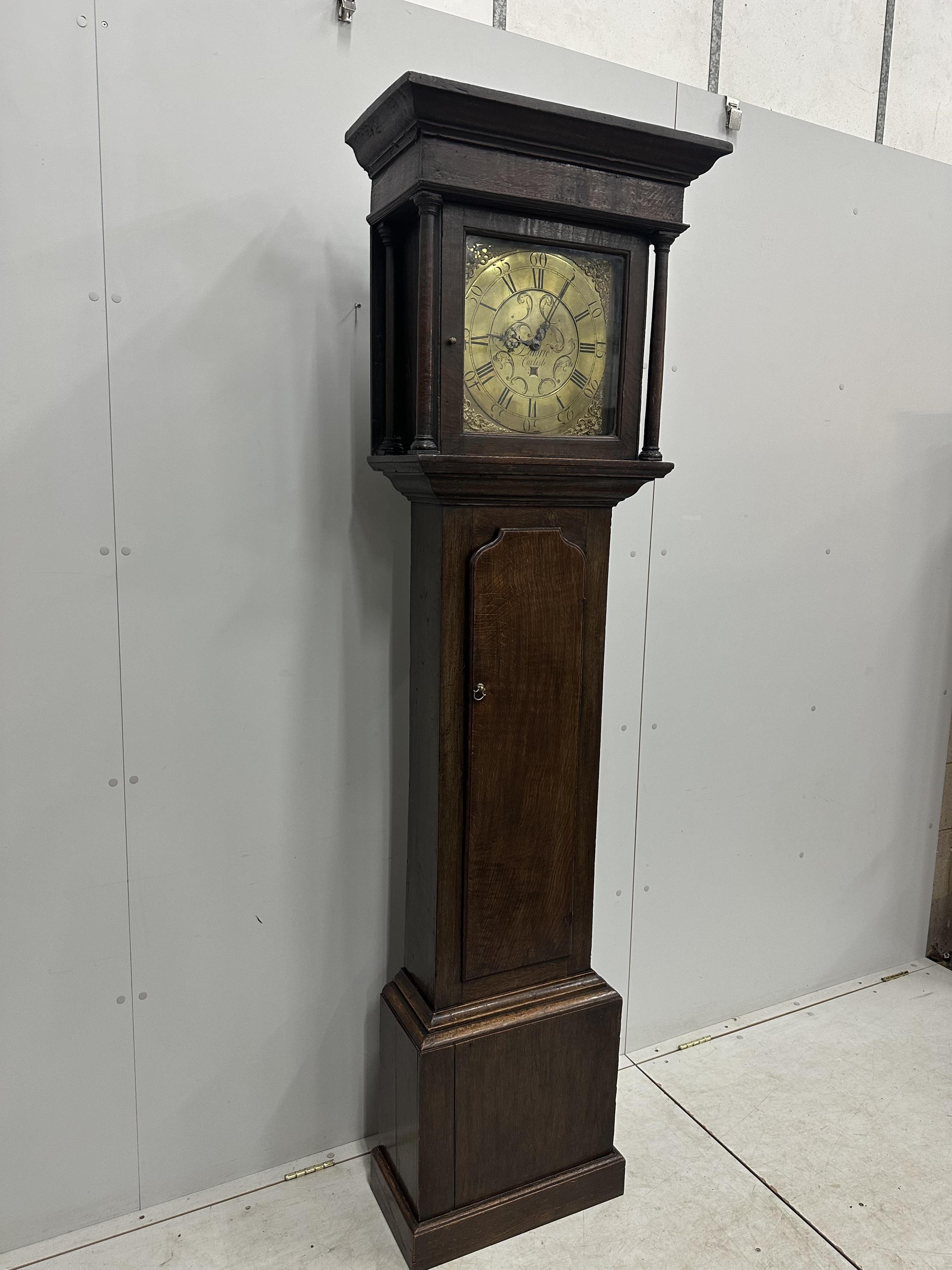 A mid 18th century oak 30 hour longcase clock, the square brass dial marked Lawrie, Carlisle, height 205cm. Condition - poor to fair